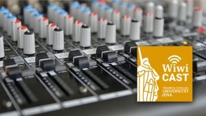 mixing console next to the Wiwi Cast logo